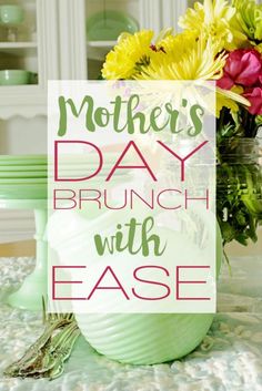 mother's day brunch with ease sign in front of flowers and plates