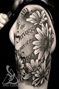 a woman's arm with sunflowers on it and the words, if the struggle is part of the story