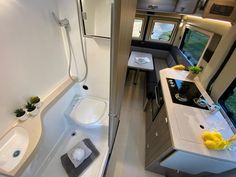 a bathroom with a sink, toilet and bathtub in the middle of an rv