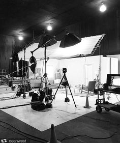 black and white photograph of lighting equipment in a studio