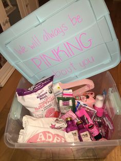 a plastic container filled with personal care items and pink writing on the lid that says we all always be drinking