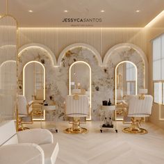 the interior of a salon with white chairs and gold accents