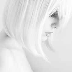 black and white photograph of a woman with short blonde hair wearing a tiara on her head