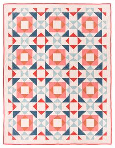 a red, white and blue quilt with geometric designs on the front is featured in this image