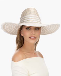 A maritime-inspired fedora made of Squishee® is perfect to use for sun protection in a resort setting where having style matters.This designer Women’s hat for sale online, with its large, contrast striped dip brim and tall elegant fedora crown, has flare to spare! Blocks 95% UVA/UVB rays Awarded the highest rating of UPF 50+ Brim Span: 5” Lightweight and easy to pack upside down in a suitcase The elasticized inner band fits most. Wide Brim Panama Hat For Pool, Chic Summer Sun Hat For Pool, Elegant Straw Hat For Pool, Chic Sun Hat For Vacation, Chic Summer Pool Hats, Chic Sun Hat With Uv Protection And Curved Brim, Elegant Brimmed Sun Hat With Uv Protection, Elegant Short Brim Boater Hat With Upf 50+, Elegant Sun Hat With Upf 50+ And Curved Brim