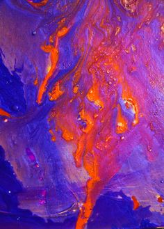 an abstract painting with orange and purple colors on it's surface, as well as water