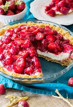 there is a pie with strawberries on it