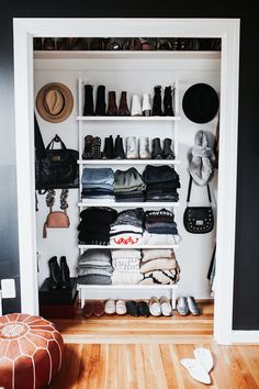 an open closet with shoes, hats and other items on the shelves in front of it