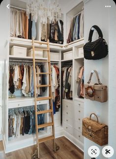 the closet is full of clothes and handbags, including an old fashioned wooden ladder