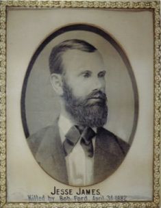 an old photo of a man with a beard