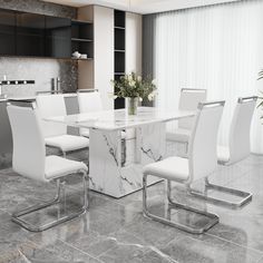 a white marble dining table surrounded by chairs