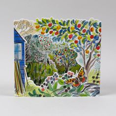 a card with an image of a house in the woods and butterflies flying around it