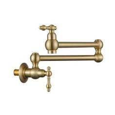 two brass faucets with handles on each side