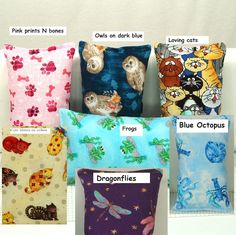 four pillows with different designs on them, all in different colors and sizes are shown