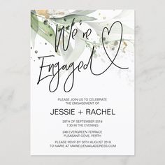 an elegant wedding card with the words we're engaged on it and flowers in black ink