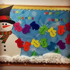 a bulletin board decorated with hearts and a snowman holding a sign that says cold warm hands hearts