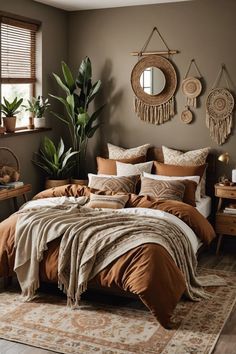 a bedroom with brown walls and lots of pillows