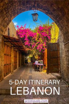 an alley way with flowers growing on it and the words 5 day itinerary lebanon