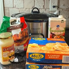 the ingredients for this meal are sitting on the counter next to the crock pot