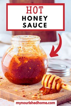 homemade hot honey sauce in a glass jar on a cutting board