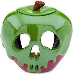 a green apple shaped like a skull