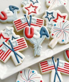 patriotic decorated cookies on a white plate