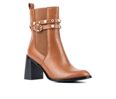 Take your look to the next level with these updated Chelsea booties. The dual elastic gores on the sides, chunky heel and round toe provide and easy and comfortable fit, while the pearl ornaments and dome studs on the straps lend an air of luxury. Faux Leather upper with Elastic side panels, Rear pull tab for easy entry, Wrap around ankle strap with buckle and pearl / dome stud details,3.1\ stacked block heel, Round Toe, Fabric / Manmade footbed, Rubber outsole | Women's Torgeis Ivy Heeled Chels Pearl Ornaments, Chelsea Rain Boots, Chelsea Boots Women, Shoes Boots Ankle, Closed Toe Shoes, Shoe Carnival, The Pearl, Shoes Booties, Side Panels