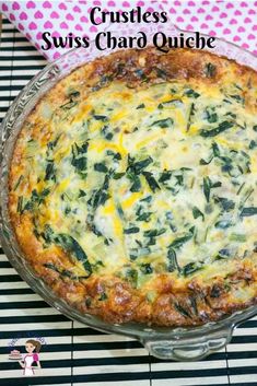 a cheesy quiche with spinach and cheese in a glass pie dish