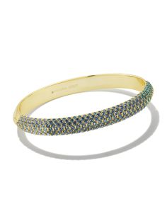 Let your wrist stack really shine when you wear the Mikki Gold Pave Bangle Bracelet in Green Blue Ombre Mix. A bold bangle covered in pave crystals, this bracelet will have you sparkling from all angles. Glam as a solo style or the perfect base for a stacked look, you can’t go wrong with this stunner. Metal 14k Gold Over Brass Material Gray Blue Crystal, Light Blue Crystal, Teal Crystal Size 2.48" Inner Diameter, 0.32" WDue to the one-of-a-kind nature of the medium, exact colors and patterns may Wrist Stack, Short Pendant Necklace, Pave Bangle, Wrist Stacks, Kendra Scott Necklace, Pave Band, Bangle Designs, Gold Bangle Bracelet, Blue Ombre