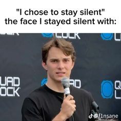 a young man holding a microphone in front of a black background with the words i chose to stay silent, the face i stay silent within