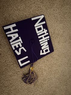 a blue graduation cap with white writing on it that says, have i heard?