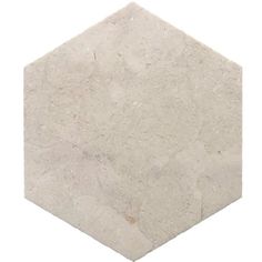 a white marble hexagonal tile on a white background