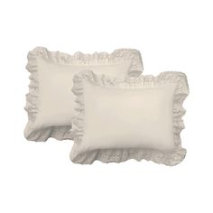 two white pillows with scalloped edges