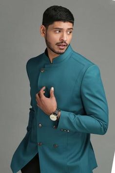 Blue angrakha style bandhgala with double button placket, asymmetric panel and overlap detail.
Component: 1
Neckline: Band
Sleeve Length: Full
Fabric: Wool Blend
Color: Blue
Note: Pant worn by the model is not for sale - Aza Fashions Bandhgala For Men, Angrakha Style, Blue Wool, Not For Sale, Aza Fashion, Button Placket, Chef's Jackets, Wool Blend, Color Blue