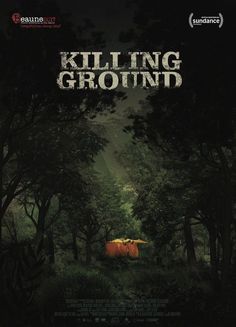 a movie poster for killing ground with an image of a cow in the woods at night