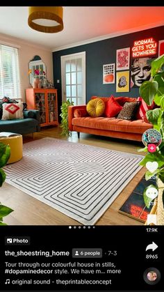 a living room filled with furniture and plants