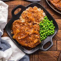 the meal is prepared and ready to be eaten on the wooden table with other dishes