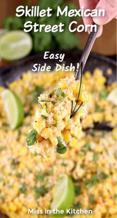 mexican street corn side dish in a cast iron skillet with a spoon scooping out