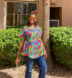 "Unique African print top made from African fabric 100% cotton. This colorful Ankara summer blouse is versatile, flattering, and available for all sizes including plus sizes. Features: Ankara blouse with split neckline. African shirt for women with side slits and fun curved hem. Wear this African top over pants, skirts, shorts, or jeans!  This item will be specially handcrafted for you upon purchase. We appreciate including your bust, waist, and hip measurements at checkout otherwise, we will us Vibrant Cotton Tops For Spring, Cotton Blouse With Abstract Print In Relaxed Fit, Cotton Blouse With Abstract Print And Relaxed Fit, Relaxed Fit Cotton Blouse With Abstract Print, Colorful Pattern Cotton Top With Short Sleeves, Vibrant Cotton Tops For Beach, Cotton Blouse With Vibrant Print For Day Out, Abstract Print Blouse For The Beach, Colorful Patterned Tops With Relaxed Fit For Summer