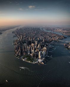 an aerial view of the city and its surrounding water in new york, united states