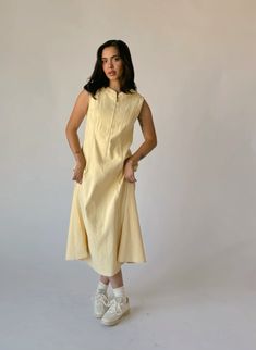 Casual Fall A-line Midi Dress, Chic Spring High-neck Maxi Dress, Chic High Neck Midi Dress For Daywear, Chic High Neck Day Dresses, Chic High Neck Daywear Dresses, Chic High Neck Dress For Daywear, Chic Spring Dress With Seam Detailing, Fall Day Out Mid-length Maxi Dress, Mid-length Maxi Dress For Fall Day Out