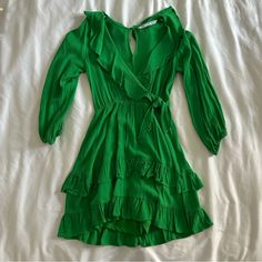 Size Xs Never Worn Shorts Underneath Summer Long Sleeve Dress With Ruffled Skirt, Long Sleeve Dress With Ruffled Skirt For Summer, Green Mini Ruffle Dress For Summer, Green V-neck Ruffle Dress For Brunch, Green Chic Ruffle Mini Dress, Chic Green Mini Ruffle Dress, Chic Green Mini Dress With Ruffle Hem, Chic Green Mini Length Ruffle Dress, Chic Green Ruffle Dress For Spring