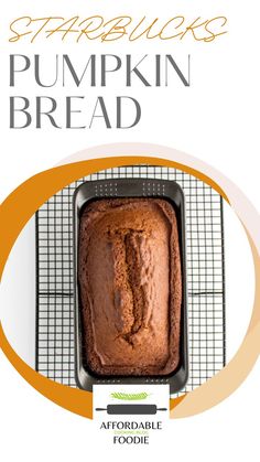 a loaf of pumpkin bread sitting on top of a cooling rack with the title starbuck's pumpkin bread