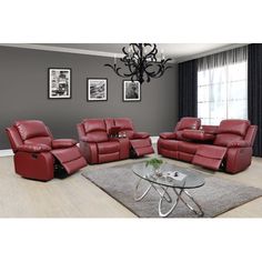 a living room filled with red leather furniture