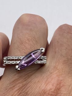 Unusual amethyst  ring Sterling setting handmade  Size 8 can be re sized for you.  My jeweler charges $20 Sterling Silver is rhodium finished to prevent tarnish All rings are shipped in a nice gift box.   Check out our over a THOUSAND great reviews Engraving is $4 per letter and is not always perfect depending on the piece. It can take a few days if the jeweler is busy. This is payable to Paypal Judithsltd@gmail.com Amethyst Heart, Vintage Jewelry Sets, Vintage Purple, Vintage Jewels, Multi Stone Ring, Etsy Jewelry, 925 Sterling Silver Earrings, Amethyst Ring, Gmail Com