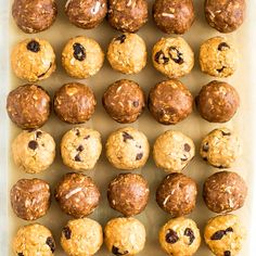 a baking tray filled with cookies and muffins