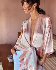 Each of our silk and charmeuse kimono robes has a fluid, liquid drape. So whether you go for 100% silk or our poly-charmeuse blend, you're going to be wrapped up in super soft luxury. Shop our full collection via link in bio! photo: @ashleystreff and @socialwellcreative Elegant Silk Kimono With Tie Waist, Elegant Kimono With Tie Waist And Kimono Sleeves, Pink Elegant Kimono For Loungewear, Elegant Pink Kimono For Loungewear, Elegant Open Front Pink Kimono, Pink Silk Kimono For Wedding, Pink Silk Wedding Kimono, Wedding Silk Wrap Kimono, Pink Silk Wedding Robe