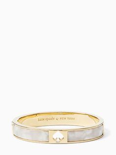 we say stack your bracelets to make a statement. this makes the first one in your pile. or the 100th. | Kate Spade Hole Punch Spade 10Mm Spade Hinge Bangle, Cream Multi White Kate Spade Jewelry, Kate Spade White Round Jewelry, Silver Kate Spade Bangle Bracelet, Kate Spade Bangle Jewelry Gift, Kate Spade Bangle Jewelry For Gift, Kate Spade Bangle Bracelets For Wedding, Kate Spade Bangle Bracelet For Weddings, Bracelets To Make, Kate Spade Bracelet