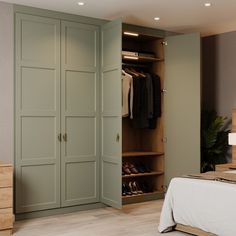 a bedroom with a bed and closets in it