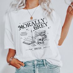 Morally Grey Book Club Shirt, Romantasy Reader Shirt, Bookish Shirt, Dark Romance Shirt, Booktok Shirt, Comfort Colors, Fantasy Reader Shirt. Comfort Colors soft-washed, garment-dyed fabric brings extra coziness to your wardrobe while the relaxed fit makes it an excellent daily choice. The double-needle stitching throughout the tee makes it highly durable while the lack of side seams helps the shirt retain its tubular shape. Shirts consist of high quality, 100% ring-spun US cotton for long-lasti Bookish Shirt Designs, Literary White Cotton Tops, White Cotton Literary Tops, Bookish Tshirt, Bookish Shirts, Cheap White Bookish T-shirt, White Bookish T-shirt As A Gift, Bookish Cotton T-shirt With Slogan, Fun Sweatshirts